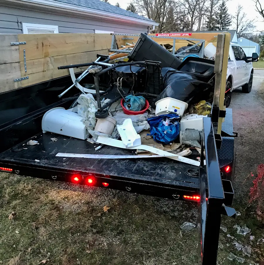 Roll-off dumpster delivered to a residential driveway in Lamar