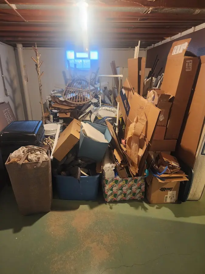 Roll-off dumpster container at job site for 15 Yard Dumpster Rental in Lamar